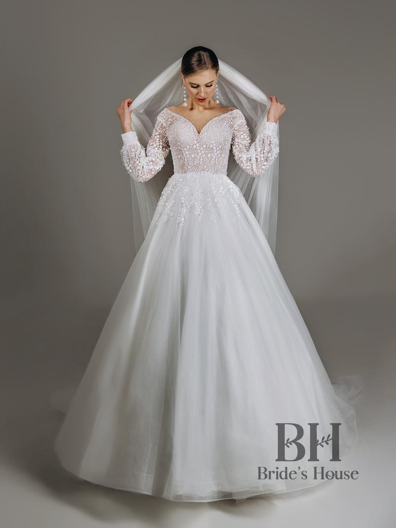 Jak elegancko klękać w sukni ślubnej – porady dla przyszłych panien młodych