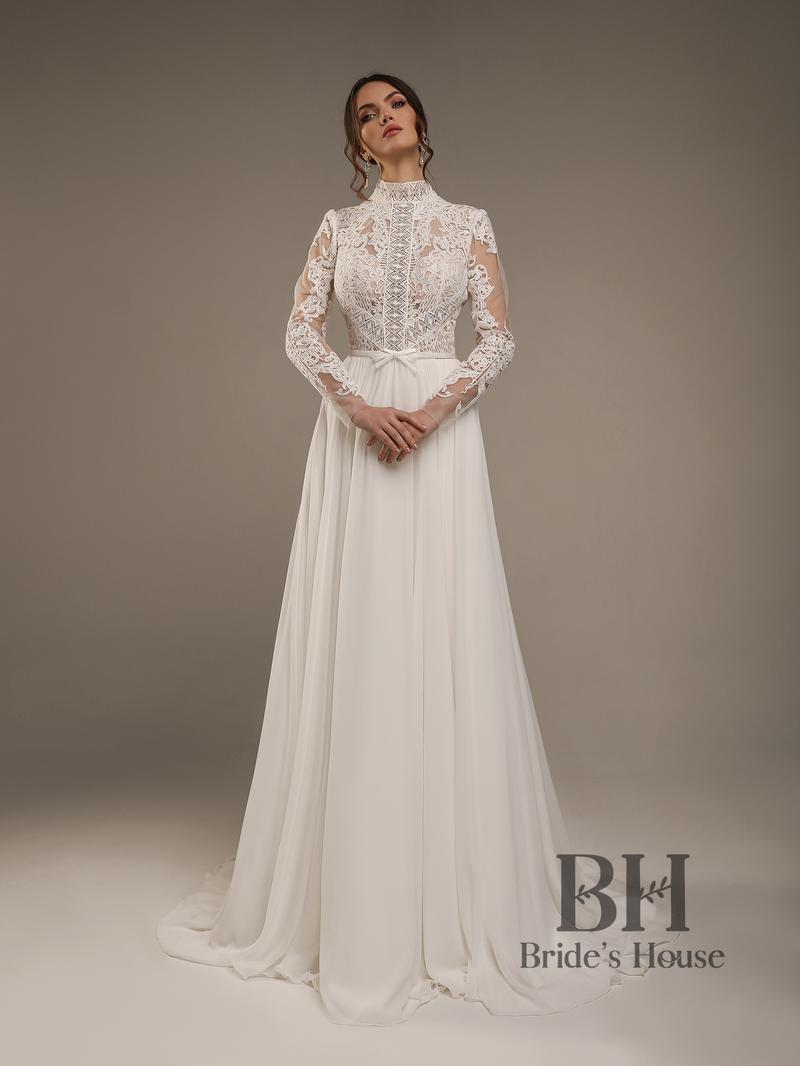 Jak swobodnie tańczyć w sukni ślubnej z trenem – porady i triki